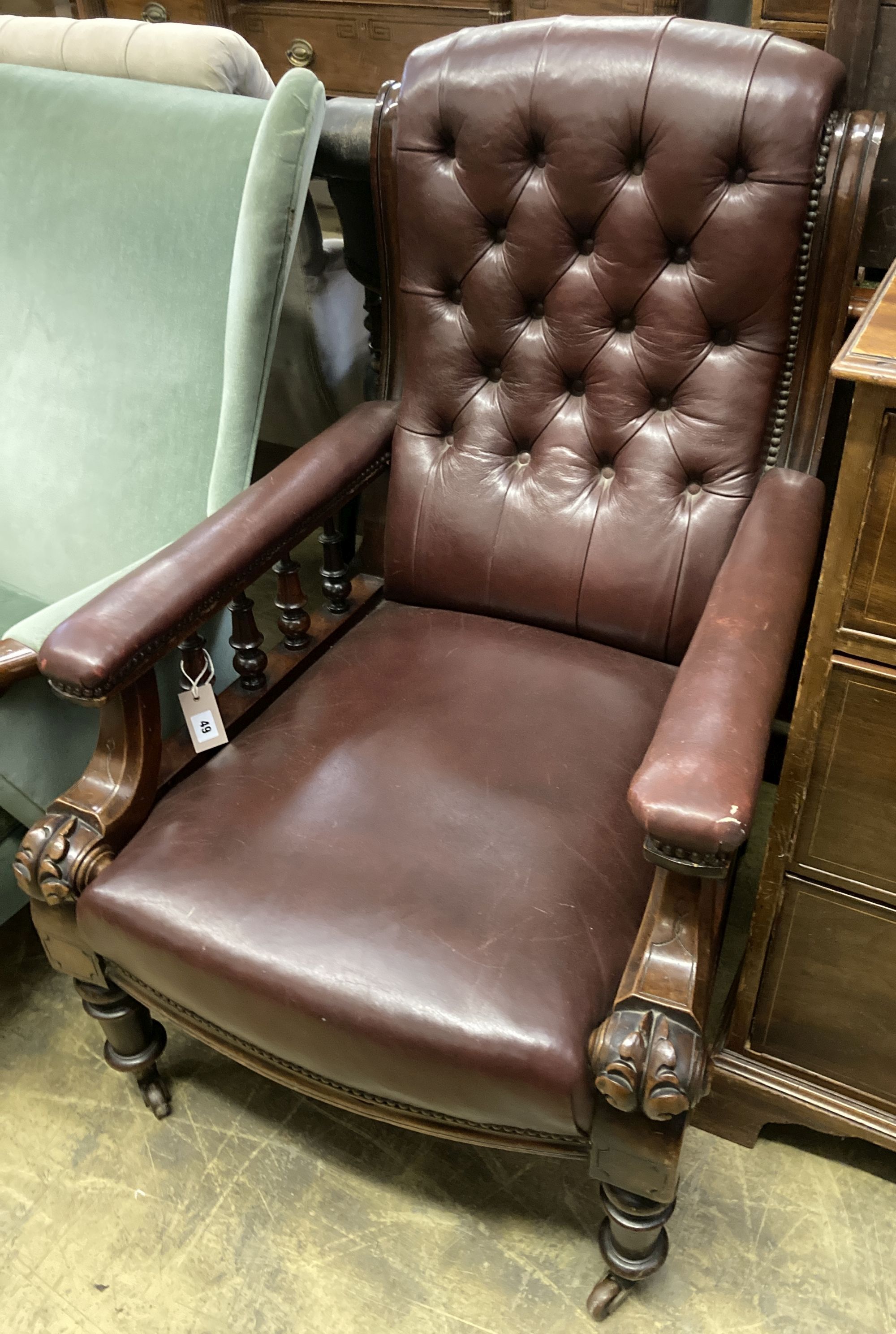 An early Victorian burgundy leather library chair, width 68cm, depth 80cm, height 98cm